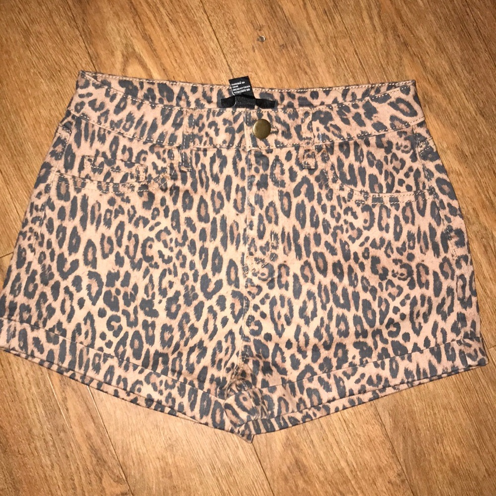 Never worn leopard shorts size 28